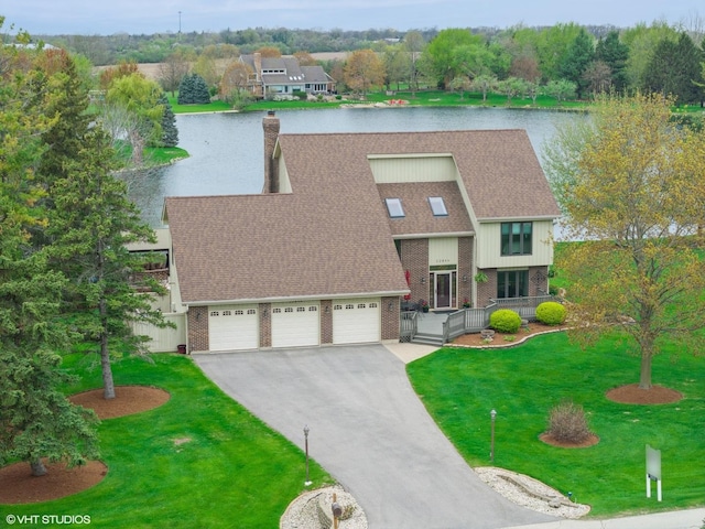 22846 W Lochanora Dr, Hawthorn Woods, IL 60047 - view of front of house featuring a shingled roof, driveway, brick siding, a front lawn, and a chimney