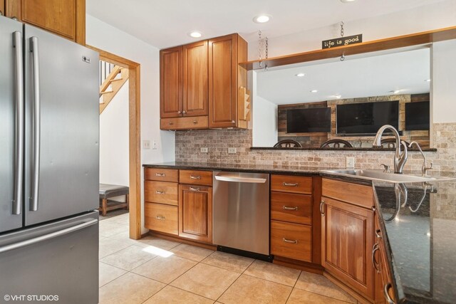 22846 W Lochanora Dr, Hawthorn Woods, IL 60047 - kitchen with stainless steel appliances, a sink, decorative backsplash, brown cabinetry, and recessed lighting