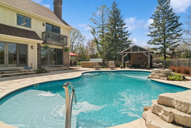 22846 W Lochanora Dr, Hawthorn Woods, IL 60047 - view of swimming pool featuring a gazebo, a patio, a fenced backyard, entry steps, and an outdoor living space