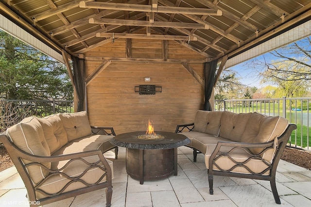 22846 W Lochanora Dr, Hawthorn Woods, IL 60047 - view of patio / terrace featuring an outdoor living space with a fire pit, fence, and a gazebo