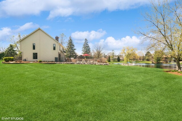 22846 W Lochanora Dr, Hawthorn Woods, IL 60047 - view of grassy yard featuring a water view