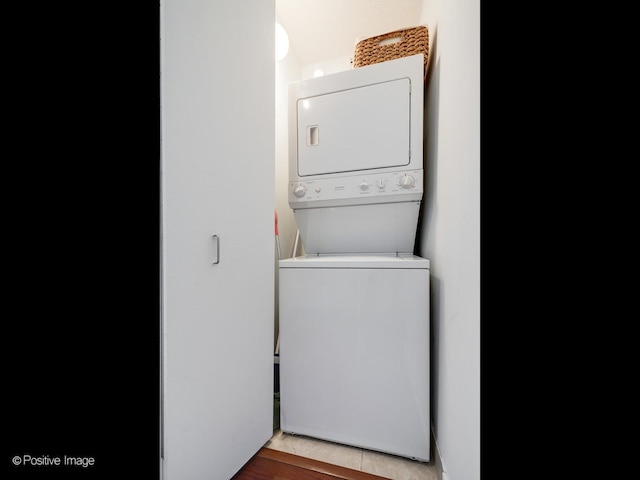 222 N Columbus Dr Unit 809, Chicago, IL 60601 - clothes washing area featuring stacked washing maching and dryer