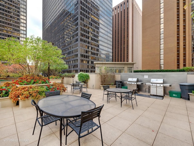 222 N Columbus Dr Unit 809, Chicago, IL 60601 - view of patio / terrace featuring outdoor dining space and a grill