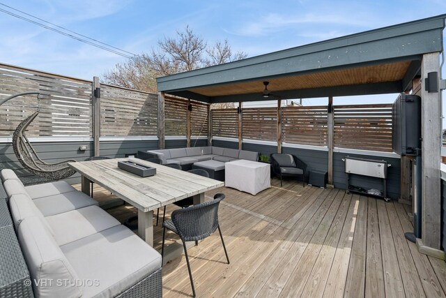 2733 N Maplewood Ave, Chicago, IL 60647 - deck with a fenced backyard, outdoor dining area, and an outdoor hangout area