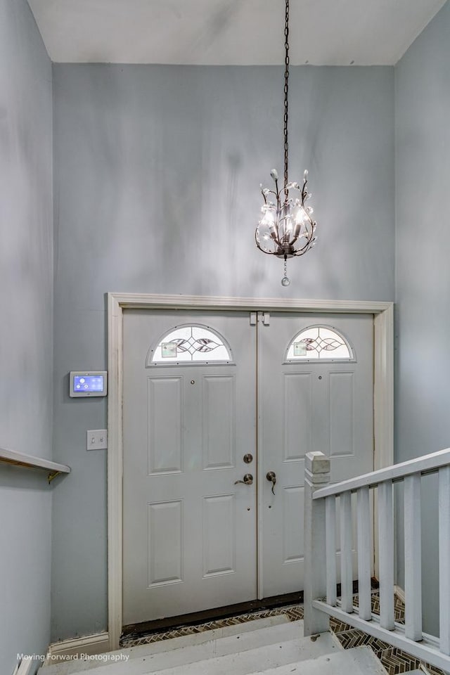 2434 W 47th Pl, Chicago, IL 60632 - foyer entrance featuring a chandelier and a wealth of natural light