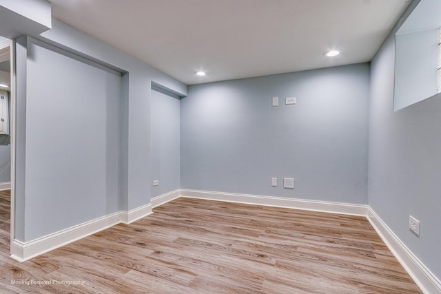 2434 W 47th Pl, Chicago, IL 60632 - finished below grade area with baseboards, light wood finished floors, and recessed lighting
