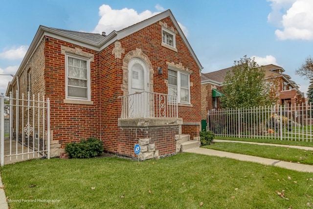 2434 W 47th Pl, Chicago, IL 60632 - view of front of property with fence, a front lawn, and brick siding