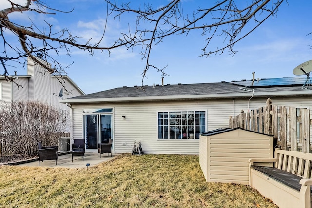 1412 Plantain Dr, Minooka, IL 60447 - rear view of house featuring fence, a patio area, a storage shed, and a yard