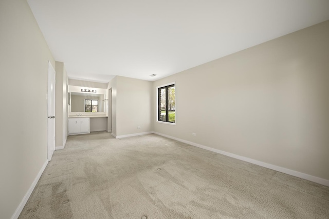 924 Coach Rd Unit 1, Palatine, IL 60074 - unfurnished living room featuring light colored carpet and baseboards