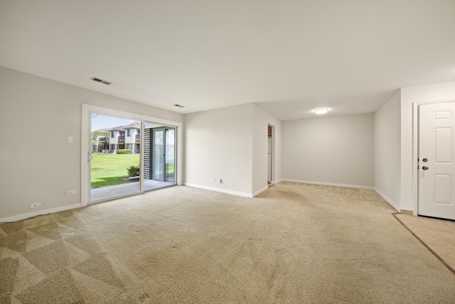 924 Coach Rd Unit 1, Palatine, IL 60074 - empty room featuring light carpet and baseboards