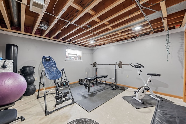 exercise area featuring baseboards and visible vents