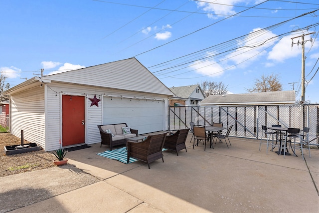 view of patio / terrace featuring a fenced backyard, an outdoor living space, and outdoor dining space