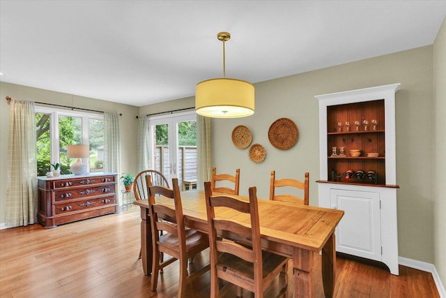 1104 Parkview Dr, Mahomet, IL 61853 - dining area featuring wood finished floors and baseboards