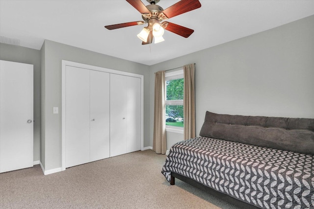 1104 Parkview Dr, Mahomet, IL 61853 - bedroom featuring carpet floors, a closet, and a ceiling fan