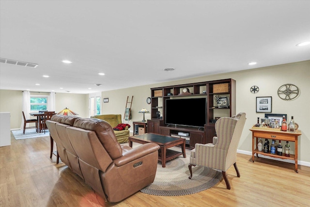 1104 Parkview Dr, Mahomet, IL 61853 - living area featuring light wood-style floors and recessed lighting