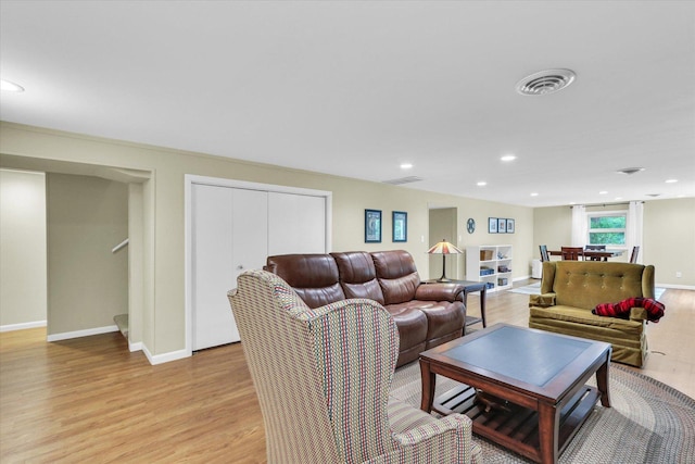 1104 Parkview Dr, Mahomet, IL 61853 - living area with light wood-style floors, stairway, and recessed lighting