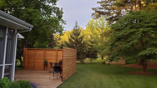 1104 Parkview Dr, Mahomet, IL 61853 - view of grassy yard featuring a wooden deck