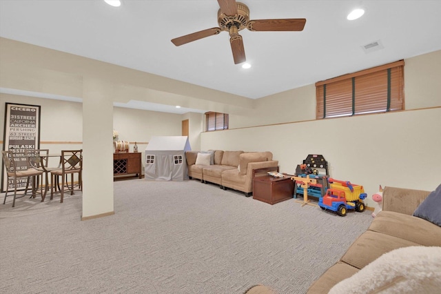living room with recessed lighting, carpet floors, visible vents, and a ceiling fan