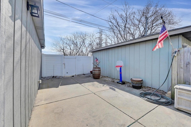 view of patio / terrace featuring a gate and fence