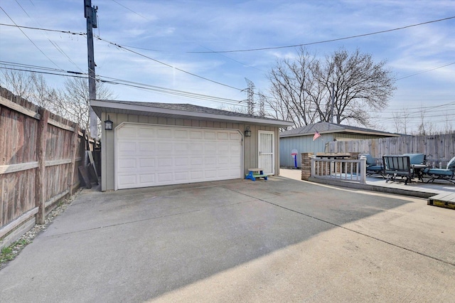 detached garage with fence
