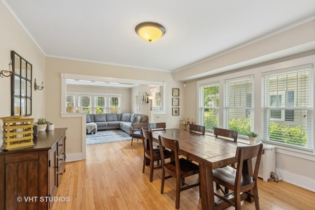 406 S Evergreen Ave, Arlington Heights, IL 60005 - dining area featuring plenty of natural light, light wood-style flooring, baseboards, and crown molding