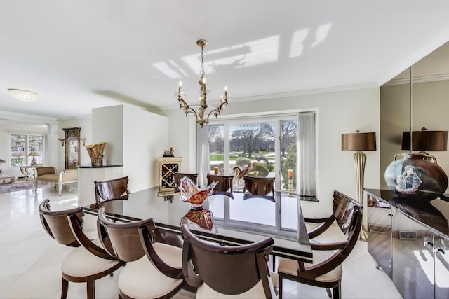 dining area featuring a notable chandelier, ornamental molding, and a wealth of natural light