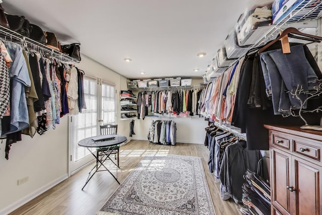 walk in closet featuring light wood-type flooring