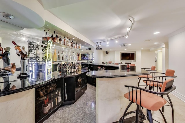 bar with recessed lighting and indoor wet bar