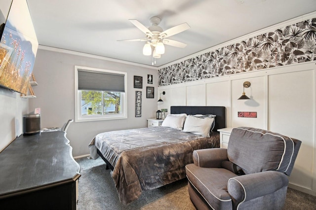 carpeted bedroom with ceiling fan and ornamental molding