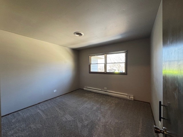 707 Crestview Dr, Ingleside, IL 60041 - carpeted spare room with a baseboard heating unit and visible vents