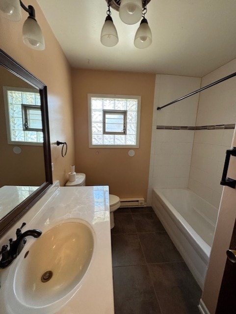 707 Crestview Dr, Ingleside, IL 60041 - full bathroom featuring toilet, baseboard heating, bathtub / shower combination, vanity, and tile patterned flooring