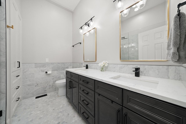 2041 W Division St Unit 304, Chicago, IL 60622 - full bathroom featuring a sink, tile walls, double vanity, and visible vents