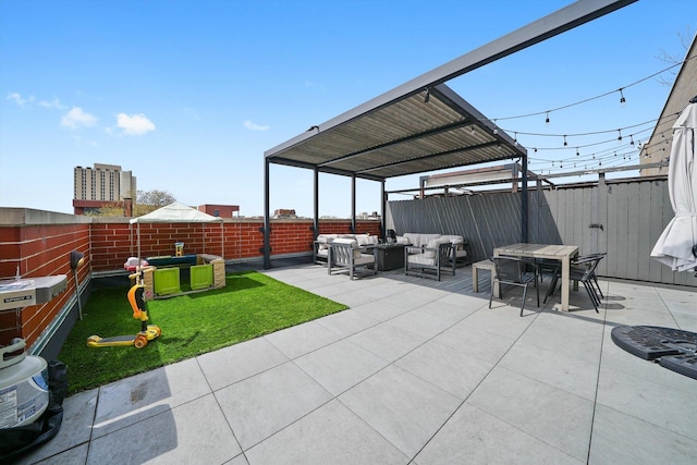 2041 W Division St Unit 304, Chicago, IL 60622 - view of patio with an outdoor hangout area, outdoor dining space, and a fenced backyard