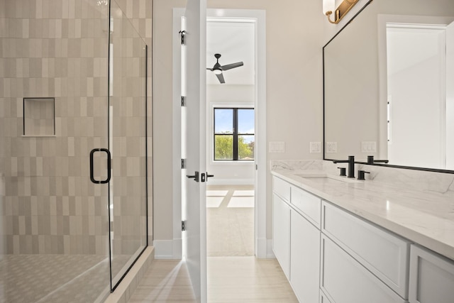 4347 N Richmond Ave Unit 3N, Chicago, IL 60618 - full bath with a stall shower, vanity, baseboards, and a ceiling fan