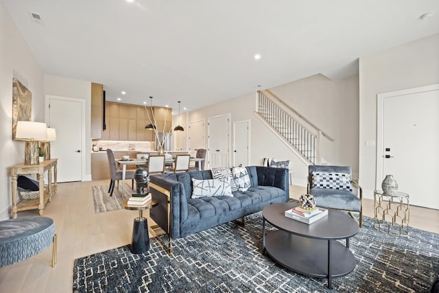 4347 N Richmond Ave Unit 3N, Chicago, IL 60618 - living room featuring stairway, wood finished floors, and recessed lighting