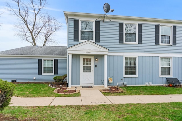 1290 Pleasant Ave Unit C, Glendale Heights, IL 60139 - view of front of property with board and batten siding and a front lawn