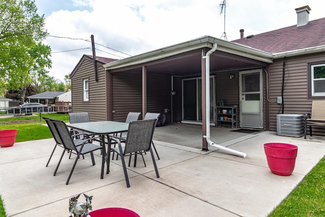 view of patio / terrace with outdoor dining area and fence