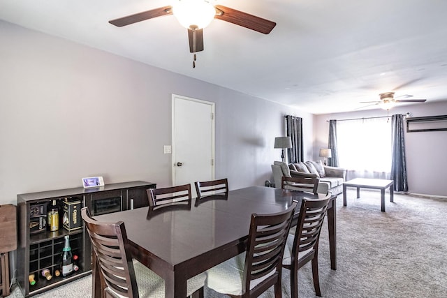carpeted dining space featuring ceiling fan