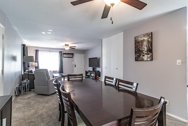 dining area with a ceiling fan and carpet flooring