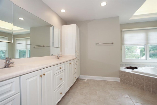37 River Ridge Drive, Sleepy Hollow, IL 60118 - bathroom with double vanity, a garden tub, and recessed lighting