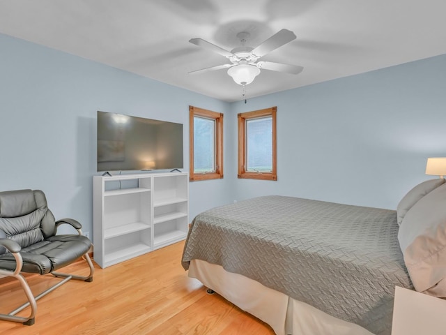 bedroom featuring ceiling fan and wood finished floors