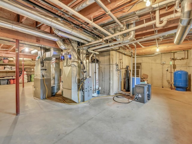unfinished basement featuring heating unit and water heater