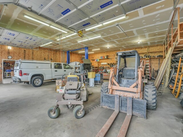 garage with a workshop area