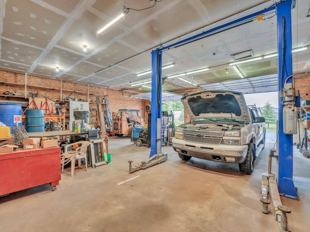 garage with a workshop area