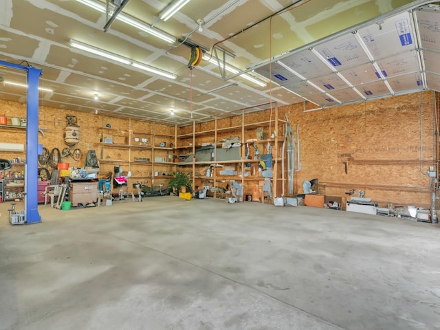 garage with a workshop area