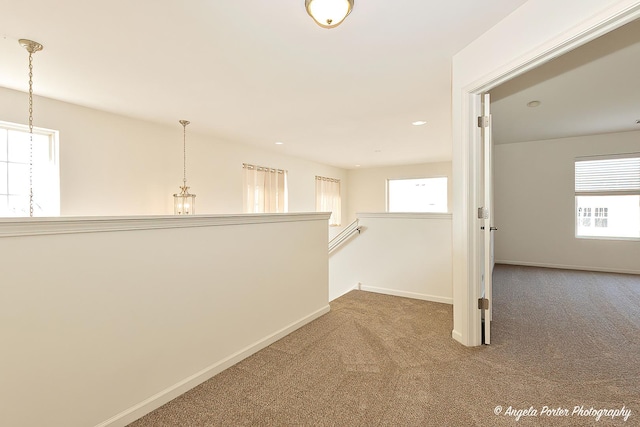 interior space with recessed lighting and baseboards
