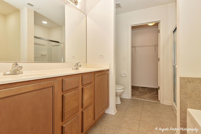 full bath featuring a sink, visible vents, and a stall shower