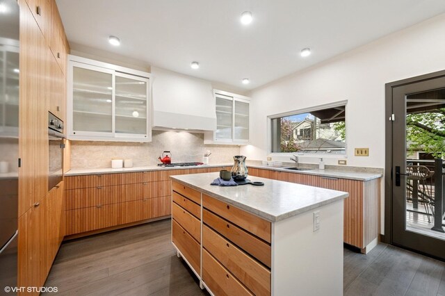 1333 N Bell Ave, Chicago, IL 60622 - kitchen with dark wood-style flooring, appliances with stainless steel finishes, modern cabinets, a center island, and recessed lighting