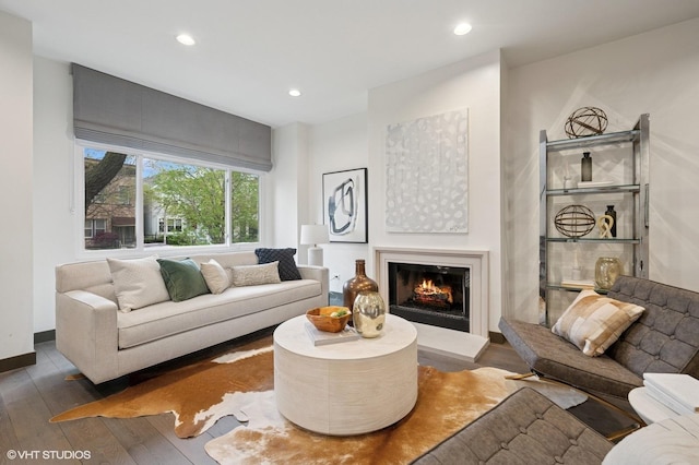 1333 N Bell Ave, Chicago, IL 60622 - living area with hardwood / wood-style flooring, recessed lighting, and a warm lit fireplace