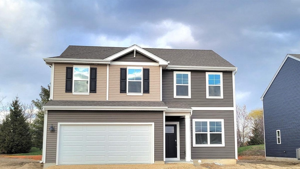 2278 Cobble Springs Dr, Wonder Lake, IL 60097 - view of front of home featuring an attached garage and driveway